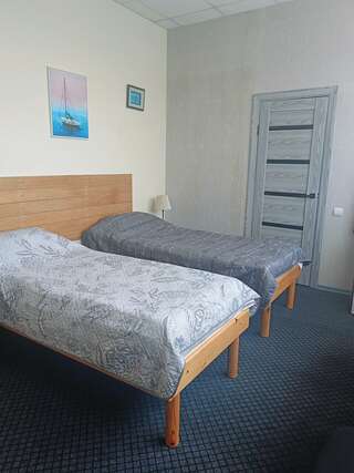 Гостиница Паллада Славянка Двухместный номер с 2 отдельными кроватями-1