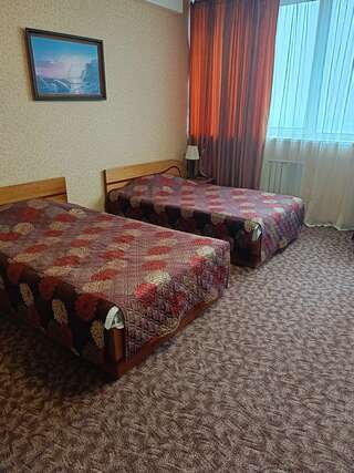 Гостиница Паллада Славянка Двухместный номер с 2 отдельными кроватями-8